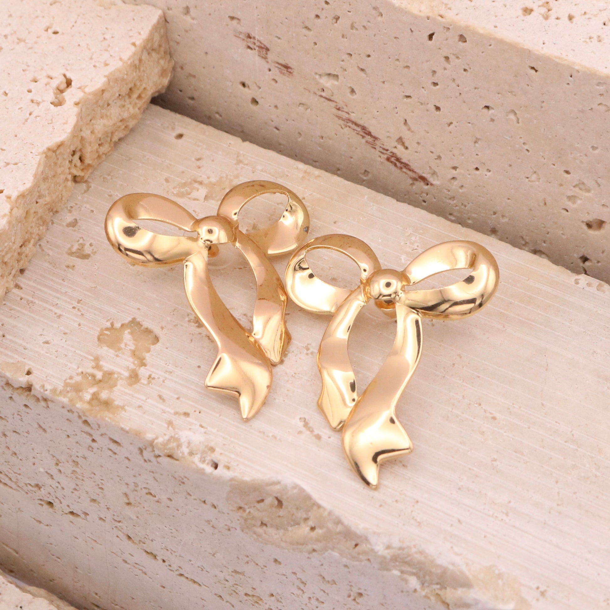 ORECCHINI BIG FLUID BOW